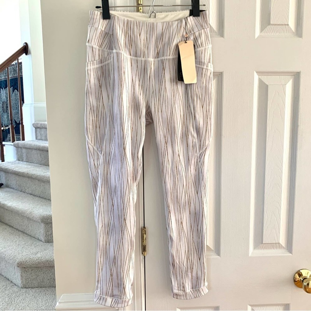NWT Calia White Leggings with some grayish shadowing and Gold & Silver Detailing